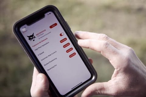 Bobcat Features On Demand Being Utilized On Smartphone