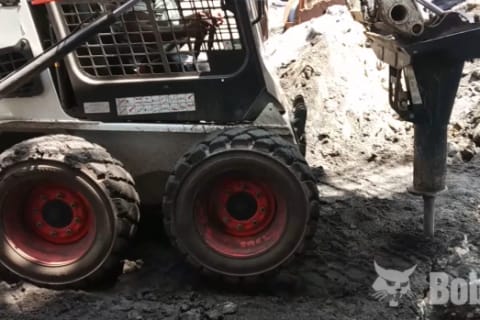 Bobcat Skid-Steer Loader wth breaker fixing foundation